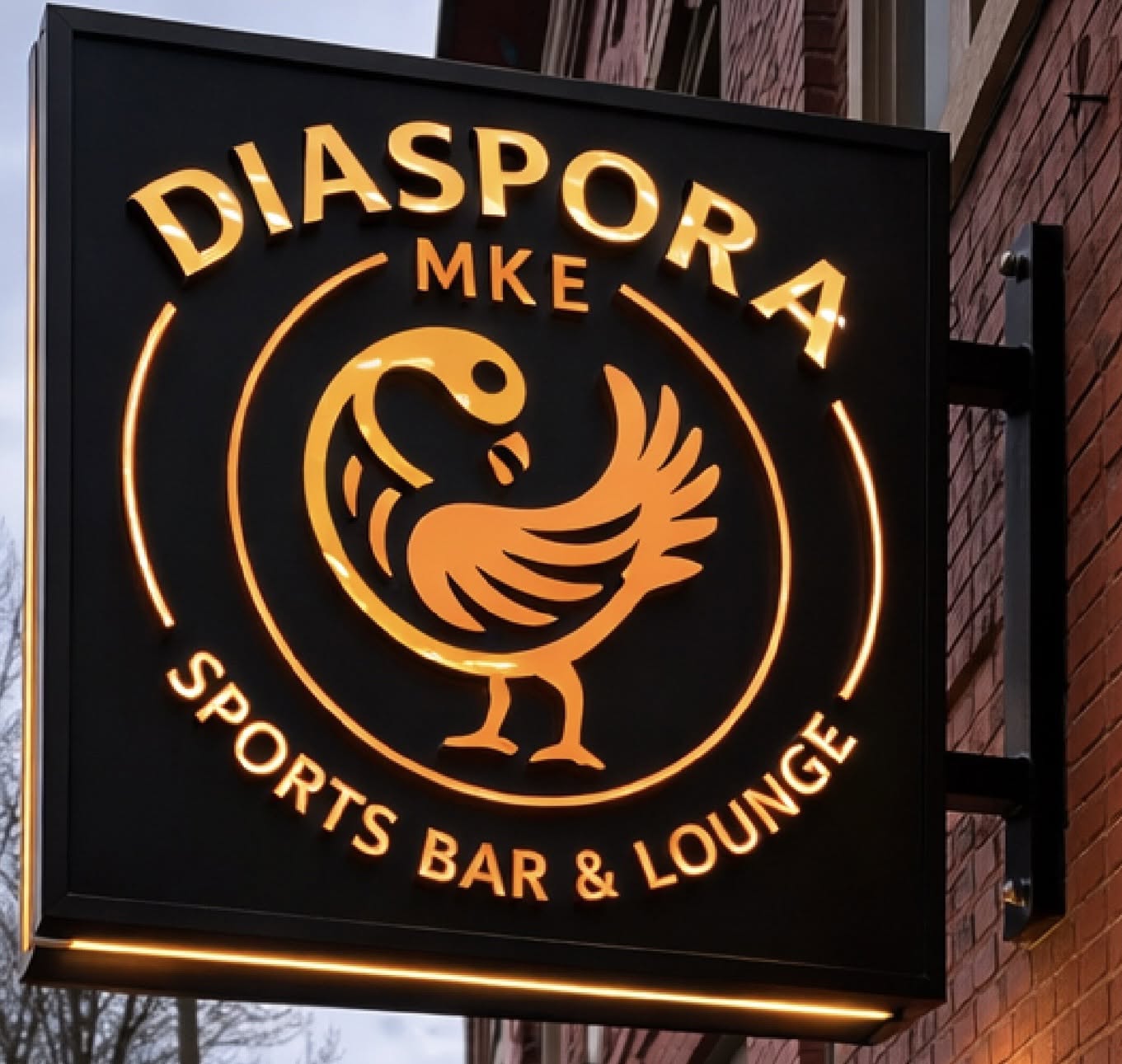 The illuminated Diaspora MKE Sports Bar and Lounge sign outside the venue